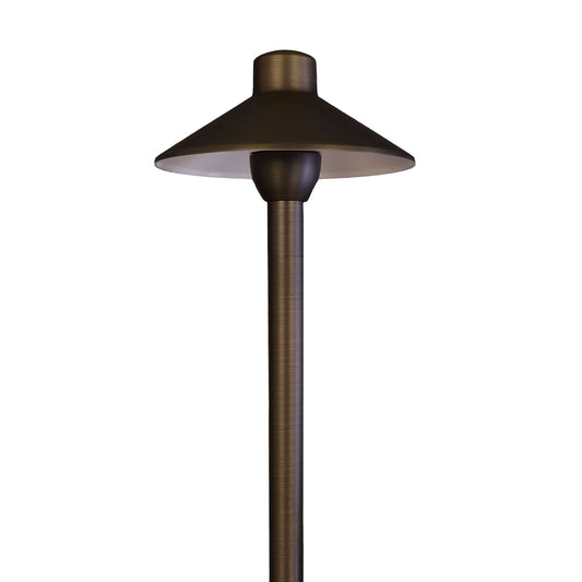 702 Lighting drop-in path light kit with a stylish Kobe hat and brass riser for landscape lighting.