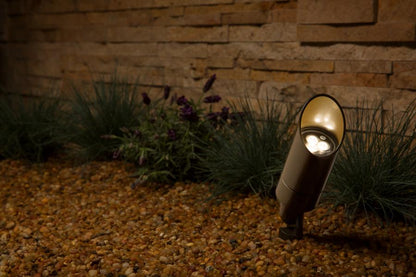 FX Luminaire MR16LED35WFL landscape lighting on a patio, highlighting plants with warm 2700K flood light.